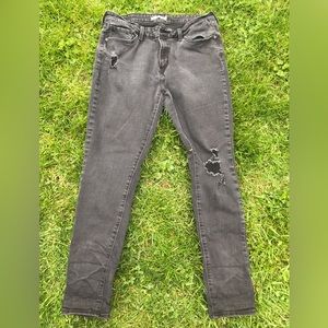 Levi’s Black 711 True Skinny ripped jeans